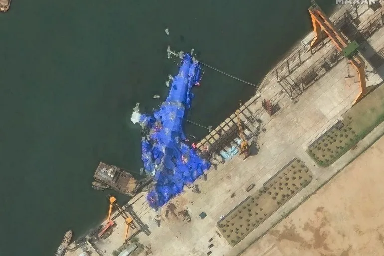 North Korea’s Naval Setback: Capsized Destroyer Salvaged Amidst Internal Turmoil